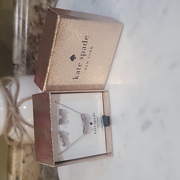 kate spade Jewelry - Kate Spade Ribbon Studs Earrings and Pendant Necklace Boxed Set in Clear/ Silver